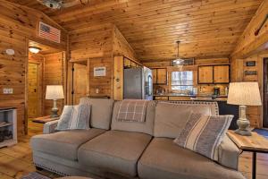 a living room with a couch in a cabin at Outdoor Lovers Haven in the Blue Ridge Mtns! in Blue Ridge