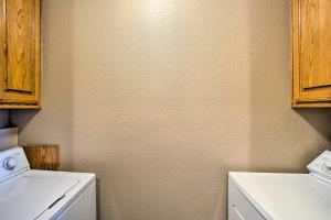 a laundry room with a washer and a washing machine at Remodeled Ranch Apt in Sanger 12 Mi to Lake! in Sanger +17 photos