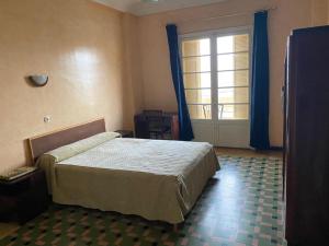 Katil atau katil-katil dalam bilik di Hotel Le Gardenia (ex Lutetia)