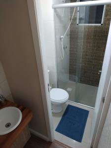 Ванна кімната в Apartamento Tranquilo Próximo ao Aeroporto. Sem taxa de limpeza