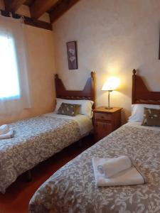 Cama o camas de una habitación en Casa Rural El Labriego