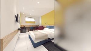A bed or beds in a room at Dovzhenko