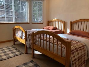 Lova arba lovos apgyvendinimo įstaigoje Kingswood Estate Cabin Retreat