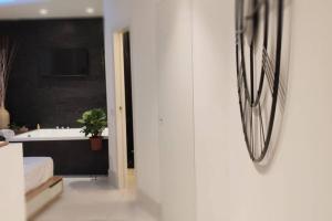 Galería fotográfica de Elegante open space con vasca idromassaggio a Trastevere en Roma