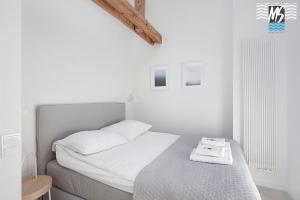 Posteľ alebo postele v izbe v ubytovaní MS Apartments Top Center VII