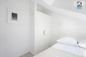 Posteľ alebo postele v izbe v ubytovaní MS Apartments Top Center VII