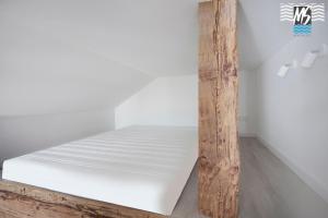 Posteľ alebo postele v izbe v ubytovaní MS Apartments Top Center VII