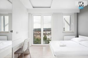 Posteľ alebo postele v izbe v ubytovaní MS Apartments Green Hill II