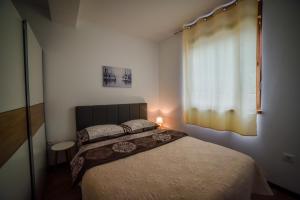 Ένα ή περισσότερα κρεβάτια σε δωμάτιο στο Forest12