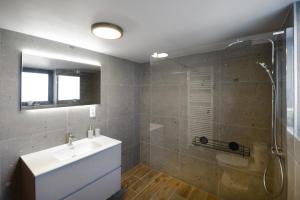 Een badkamer bij Maison 25