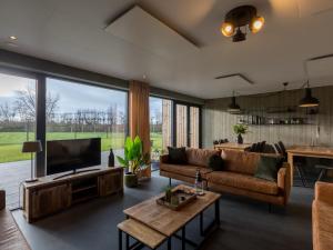 A seating area at House in Vrouwenpolder near Beach