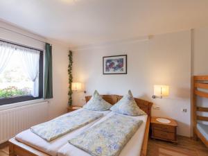 Katil atau katil-katil dalam bilik di Cozy Holiday Home in Hallenberg with Terrace