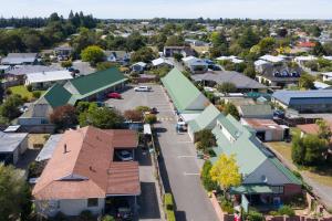 an aerial view of a small town with houses at Ashburton's Regency Motel in Ashburton