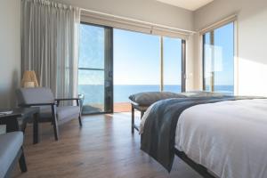 The Cove Tasmania客房内的一张或多张床位