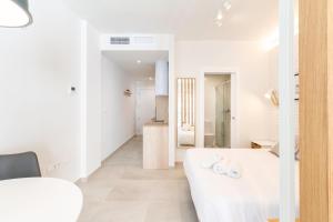 Posteľ alebo postele v izbe v ubytovaní WintowinRentals Apartamento sostoa 156
