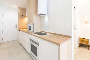 Kuchyňa alebo kuchynka v ubytovaní WintowinRentals Apartamento sostoa 156