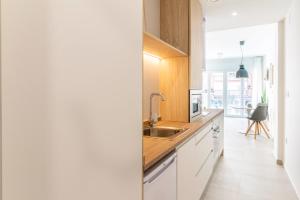 Kuchyňa alebo kuchynka v ubytovaní WintowinRentals Apartamento sostoa 156