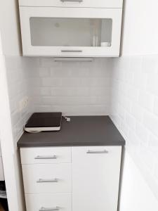 Kuchyň nebo kuchyňský kout v ubytování Sissi Apartments