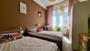 Postel nebo postele na pokoji v ubytování Hostel Moderna Rest