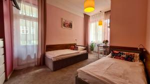 Postel nebo postele na pokoji v ubytování Hostel Moderna Rest
