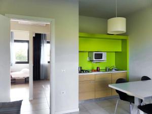 Η κουζίνα ή μικρή κουζίνα στο Apartment Belvedere Village-1 by Interhome