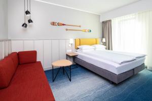Łóżko lub łóżka w pokoju w obiekcie Holiday Inn Gdansk - City Centre, an IHG Hotel