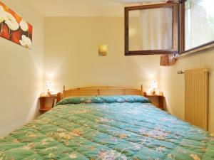 Posteľ alebo postele v izbe v ubytovaní Apartment Monti Pallidi by Interhome
