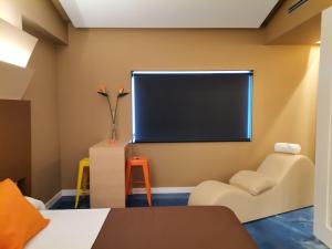 A bed or beds in a room at Motel Latino