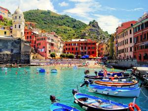 a group of boats in the water in a city at Residence Mare Azzurro in Lerici