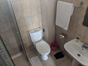 Ένα μπάνιο στο Prestige Hotel Suites