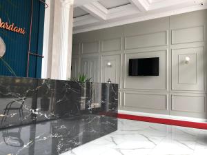 TV a/nebo společenská místnost v ubytování Hotel Dardani