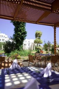 Restoranas ar kita vieta pavalgyti apgyvendinimo įstaigoje Regency Tunis Hotel