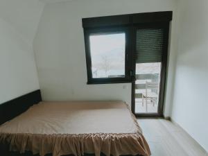 Säng eller sängar i ett rum på Drinski Konak