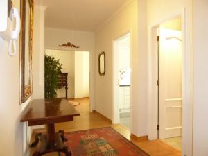 a hallway with a door leading into a room at Downtown by Check-in Portugal in Faro