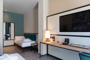 Modica Boutique Hotel客房内的一张或多张床位