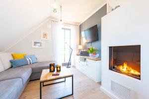 Posezení v ubytování Zur Heiderose 3 Whg 3d StrandLaeufer