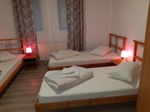 Postel nebo postele na pokoji v ubytování Carol 51 Hostel