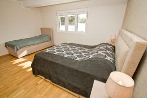Una cama o camas en una habitación de Lux Apartment "Lea" 33 fotos más