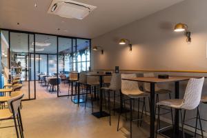 Modica Boutique Hotel餐厅或其他用餐的地方
