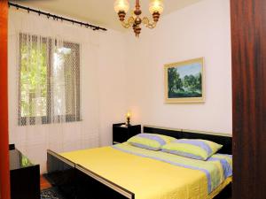 Кровать или кровати в номере Apartments Mandica