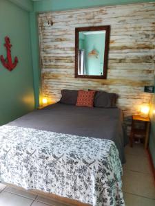 Casa Oceana Bed & Breakfast tesisinde bir odada yatak veya yataklar