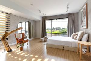 Postel nebo postele na pokoji v ubytování Brand-new Aewmai Pool Villa&Promotion◆byน้องมังคุด + 37 fotografií