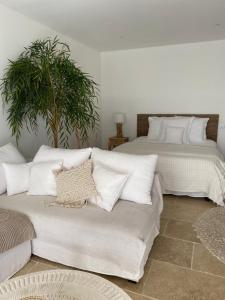 מיטה או מיטות בחדר ב-Casa Di l'Ortu