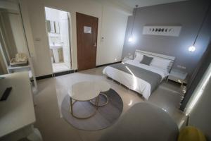 Giường trong phòng chung tại 漫時光 旅空間 ManLu INN