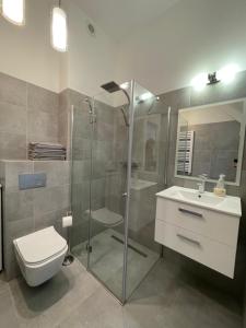 Koupelna v ubytování Biały Klif + 25 fotografií