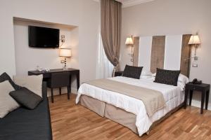 Postel nebo postele na pokoji v ubytování Hotel Clitunno