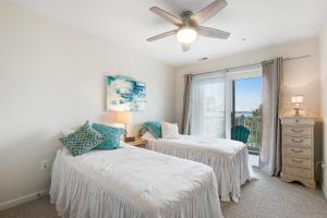 Ένα ή περισσότερα κρεβάτια σε δωμάτιο στο Villas at Beach Cove - 29086 Beach Cove Unit D2 +36 φωτογραφίες