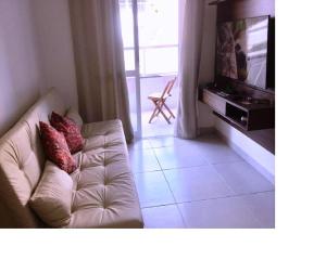 Et tv og/eller underholdning på Apartamento - Residencial Vista Verde