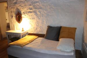 Postel nebo postele na pokoji v ubytování Lídia vendégház