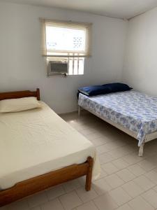 Cama o camas de una habitación en "Casa Viña Del Mar" Playa Blanca